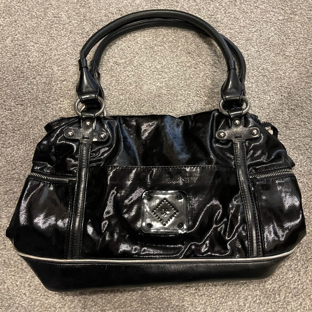 DESIGNER handbag like new by Donald J P